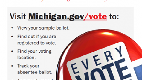 Michigan voter information center poster with link to Michigan.gov/vote