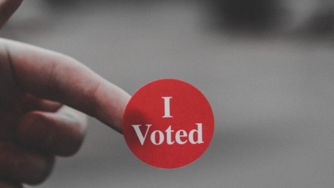 A red I voted sticker