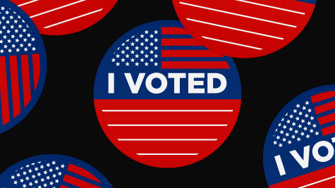 Red, white, and blue circular "I voted" stickers on a black background